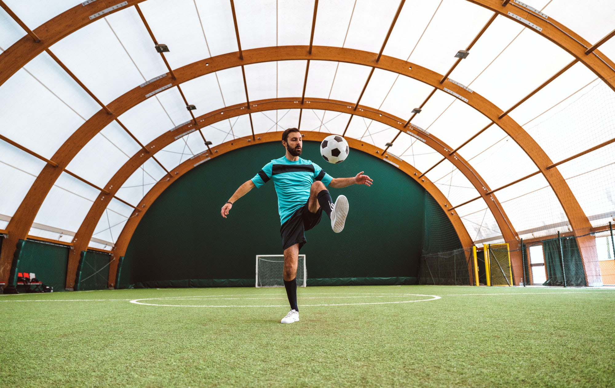 cinematic-image-of-a-soccer-freestyle-player-making-tricks-with-the-ball-1